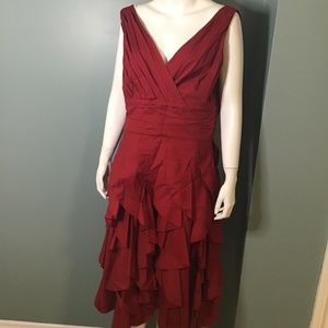 Red cotton dress with ruffle details. NWOT. Just a super fun bouncy party dress.